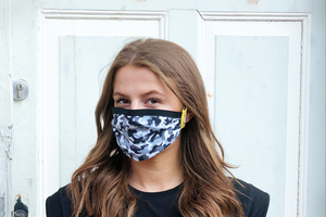 Girl with Camouflage Face Mask with Happy Mask logo